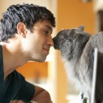 getty_rf_photo_of_man_touching_noses_with_cat